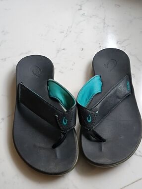 OluKai Black and Teal Comfort Flip Flops